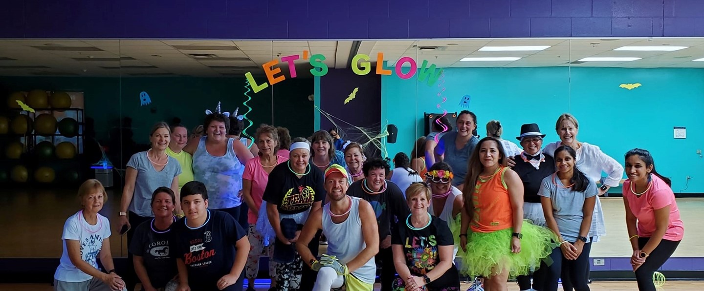 group exercise class posing together