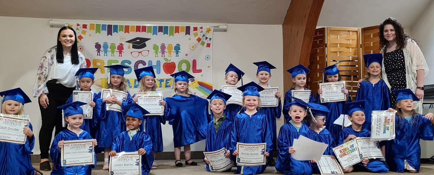 Preschool graduation class with two teachers