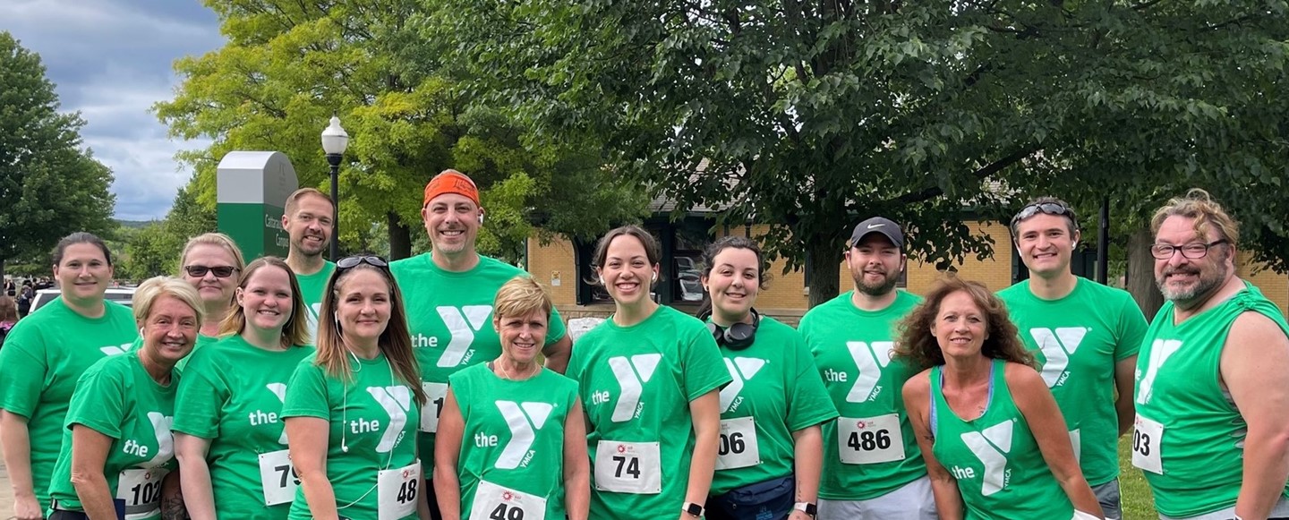 ymca 5k runners pose for photo together
