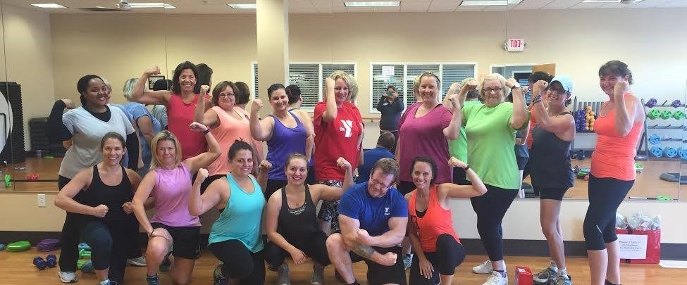 group exercise class posing together