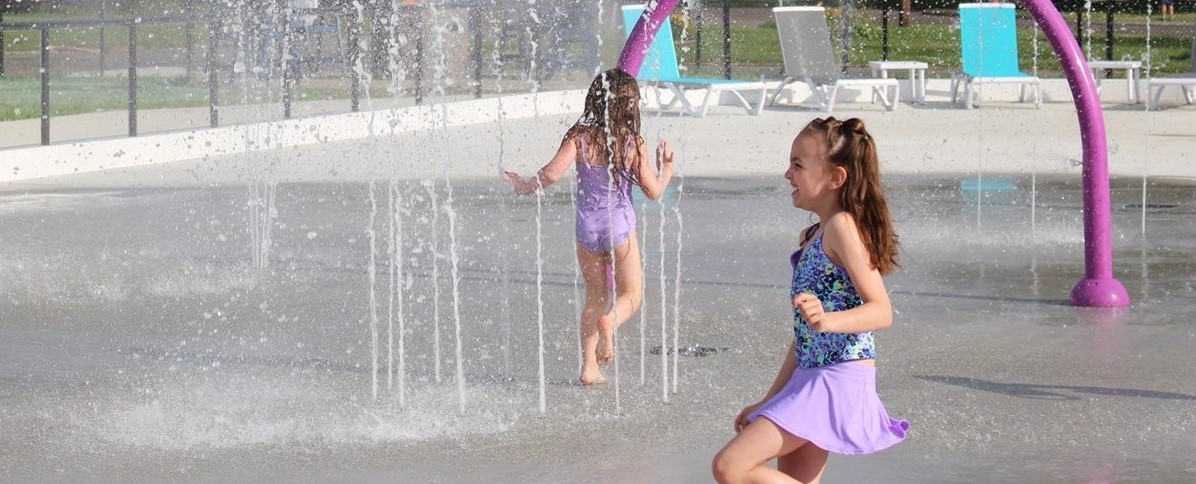 children playing on splashpad