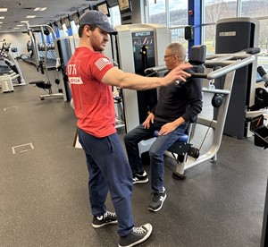 personal training with a member at the gym