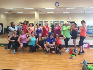 women in a group exercise class